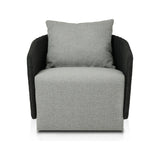 Featuring Maven Faux Black Outdoor Swivel Chair by Four Hands at Amethyst Home. Sustainably made with zero waste, luxurious Italian upholstery places a new and unique spin on indoor/outdoor seating, offering soft, durable fabric that's highly resistant to sun, stains, mold and abrasion. Shell framing in black faux-hyacinth weaves for extra texture atop a 36. Amethyst Home provides interior design, new home construction design consulting, vintage area rugs, and lighting in the Park City metro area.