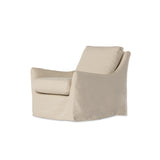Featuring Monette Natural Slipcover Swivel Chair by Four Hands at Amethyst Home. This 360-degree swivel chair is defined by slightly sloping, flared arms and a floor-length slipcover. Finished in a soft, tight weave slipcover for a traditional style. Durable and soft to the touch, Libeco™-sourced linens are artisan-made and free of toxic chemicals. Slipcovered styles are fully remova. Amethyst Home provides interior design, new construction, custom furniture and area rugs in the Seattle metro area
