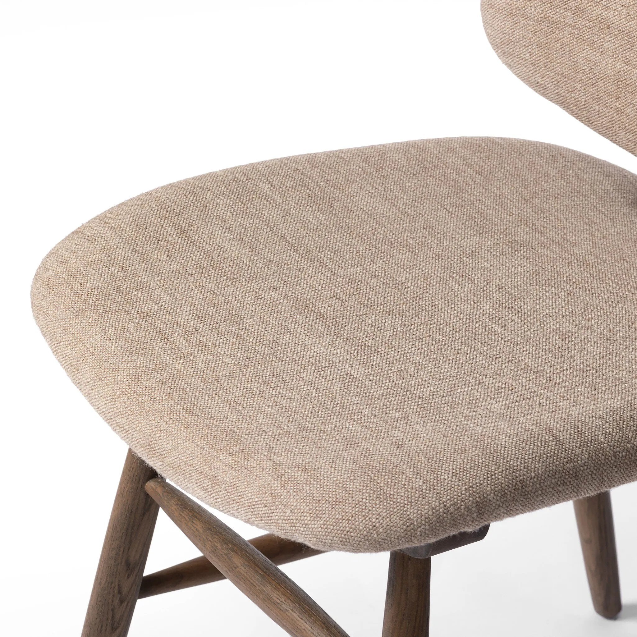 Featuring Montague Alcala Fawn Dining Chair by Four Hands at Amethyst Home. A textbook midcentury design with upholstered molded cushions pair style and comfort in one dining chair. Alternating joint positions add an unexpected architectural element to the piece. Performance fabrics are specially created to withstand spills, stains, high traffic and wear,. Amethyst Home provides interior design, new home construction design consulting, vintage area rugs, and lighting in the Los Angeles metro area.