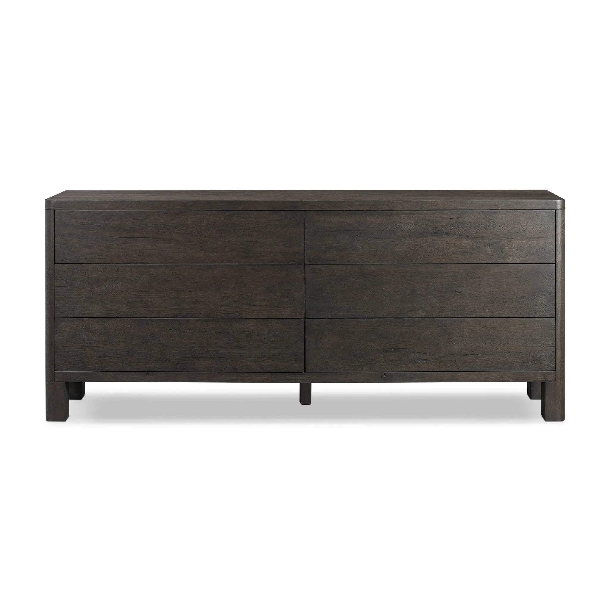 Featuring Noeline Smoked Black Oak Veneer 6 Drawer Dresser by Four Hands at Amethyst Home. Topped with a thick plank of solid oak, this extra-wide dresser blends modern lines and warm character with six roomy drawers, slightly curved corners, and solid square legs. Seamless drawer fronts have a push-latch mechanism. Made from solid oak and veneer in a smoky bla. Amethyst Home provides interior design, new home construction design consulting, vintage area rugs, and lighting in the Omaha metro area.