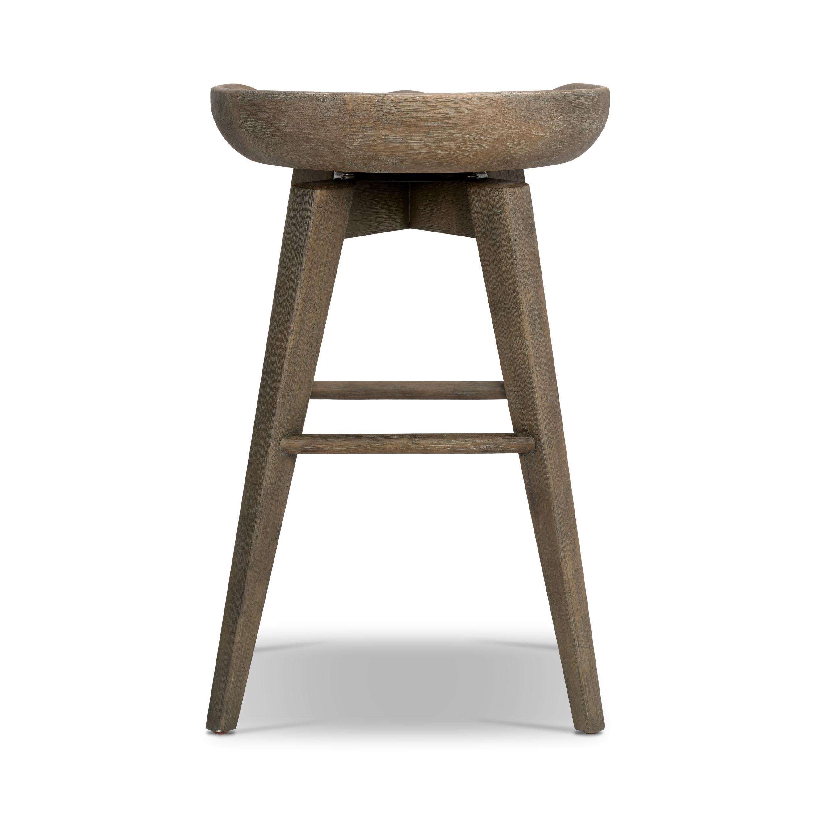 Featuring Paramore Swivel Stool by Four Hands at Amethyst Home. A fresh spin on bar seating, the parawood Paramore Swivel Stool is finished in a deep charcoal for a clean, sleek look. The stool is topped with a swivel.
Counter Stool Size: 16.25"W x 16.25"L x 26"HSeat Depth: 13.5"Seat Height: 24.75"
Bar Stool Size: 17.5"W x 17.5"L x 30.75"HSeat Depth: 13.5"Seat. Amethyst Home provides interior design, new home construction design consulting, vintage area rugs, and lighting in the Austin metro area.