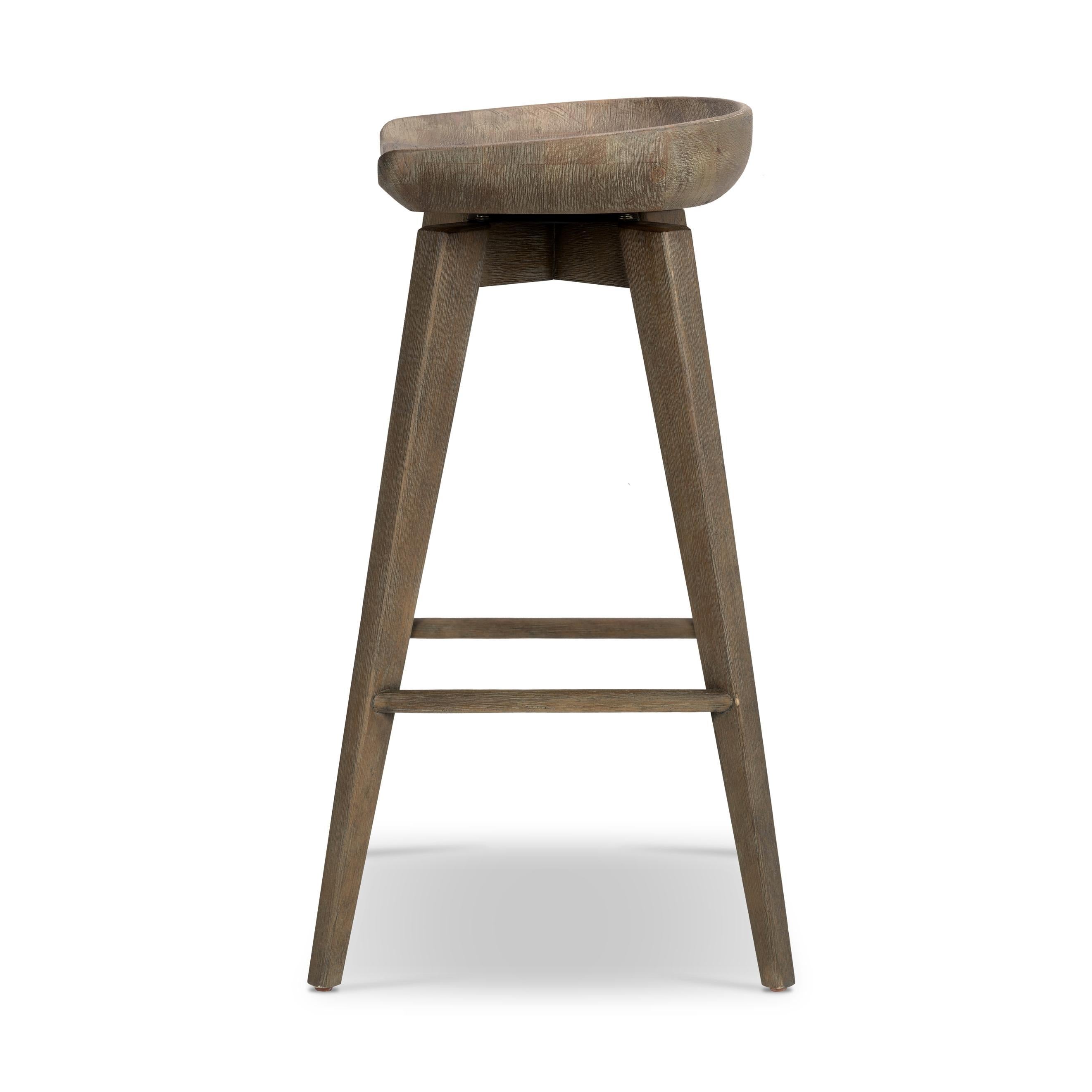 Featuring Paramore Swivel Stool by Four Hands at Amethyst Home. A fresh spin on bar seating, the parawood Paramore Swivel Stool is finished in a deep charcoal for a clean, sleek look. The stool is topped with a swivel.
Counter Stool Size: 16.25"W x 16.25"L x 26"HSeat Depth: 13.5"Seat Height: 24.75"
Bar Stool Size: 17.5"W x 17.5"L x 30.75"HSeat Depth: 13.5"Seat. Amethyst Home provides interior design, new home construction design consulting, vintage area rugs, and lighting in the Austin metro area.