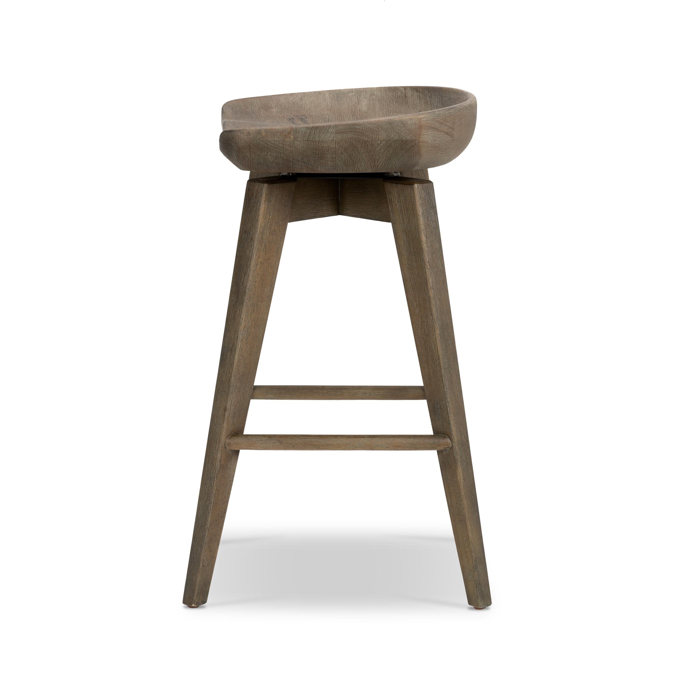 Featuring Paramore Swivel Stool by Four Hands at Amethyst Home. A fresh spin on bar seating, the parawood Paramore Swivel Stool is finished in a deep charcoal for a clean, sleek look. The stool is topped with a swivel.
Counter Stool Size: 16.25"W x 16.25"L x 26"HSeat Depth: 13.5"Seat Height: 24.75"
Bar Stool Size: 17.5"W x 17.5"L x 30.75"HSeat Depth: 13.5"Seat. Amethyst Home provides interior design, new home construction design consulting, vintage area rugs, and lighting in the Dallas metro area.