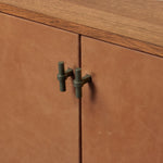 Featuring Posada Leather Small Cabinet by Four Hands at Amethyst Home. Smaller scale cabinetry of amber-finished oak, with door fronts of cognac top-grain leather and inset legs. Perfect for anywhere you need a bit of storage or pair with a large bed for nightstands!
Overall Dimensions: 18.0" L x 35.0 " W x 35.0" H
Collection: BoltonColors: Palermo Cognac ,Amb. Amethyst Home provides interior design, new home construction design consulting, vintage area rugs, and lighting in the Austin metro area.