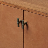 Featuring Posada Leather Small Cabinet by Four Hands at Amethyst Home. Smaller scale cabinetry of amber-finished oak, with door fronts of cognac top-grain leather and inset legs. Perfect for anywhere you need a bit of storage or pair with a large bed for nightstands!
Overall Dimensions: 18.0" L x 35.0 " W x 35.0" H
Collection: BoltonColors: Palermo Cognac ,Amb. Amethyst Home provides interior design, new home construction design consulting, vintage area rugs, and lighting in the Austin metro area.