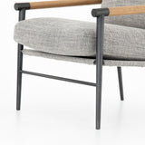 Featuring Rowen Chair - Thames Raven by Four Hands at Amethyst Home. Textural grey seating of performance-grade upholstery, with angular arms of exposed oak providing fresh contrast. Slim, carbon-finished steel legs for a dose of modern-industrial edge. Performance fabrics are specially created to withstand spills, stains, high traffic and wear, ensuring l. Amethyst Home provides interior design, new home construction design consulting, vintage area rugs, and lighting in the Alpharetta metro area.