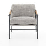 Featuring Rowen Chair - Thames Raven by Four Hands at Amethyst Home. Textural grey seating of performance-grade upholstery, with angular arms of exposed oak providing fresh contrast. Slim, carbon-finished steel legs for a dose of modern-industrial edge. Performance fabrics are specially created to withstand spills, stains, high traffic and wear, ensuring lo. Amethyst Home provides interior design, new home construction design consulting, vintage area rugs, and lighting in the Charlotte metro area.