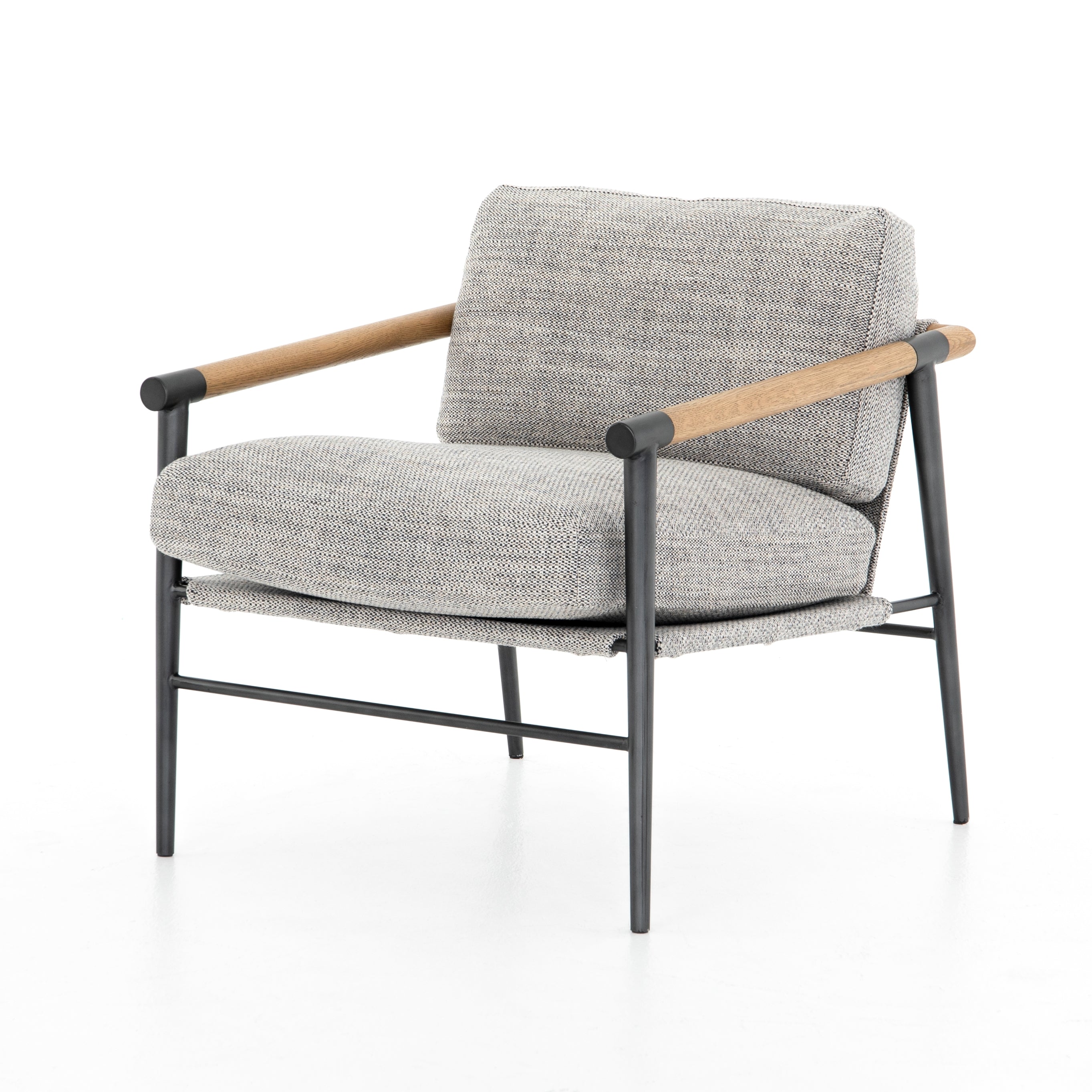 Featuring Rowen Chair - Thames Raven by Four Hands at Amethyst Home. Textural grey seating of performance-grade upholstery, with angular arms of exposed oak providing fresh contrast. Slim, carbon-finished steel legs for a dose of modern-industrial edge. Performance fabrics are specially created to withstand spills, stains, high traffic and wear, ensuring long-t. Amethyst Home provides interior design, new home construction design consulting, vintage area rugs, and lighting in the Tampa metro area.