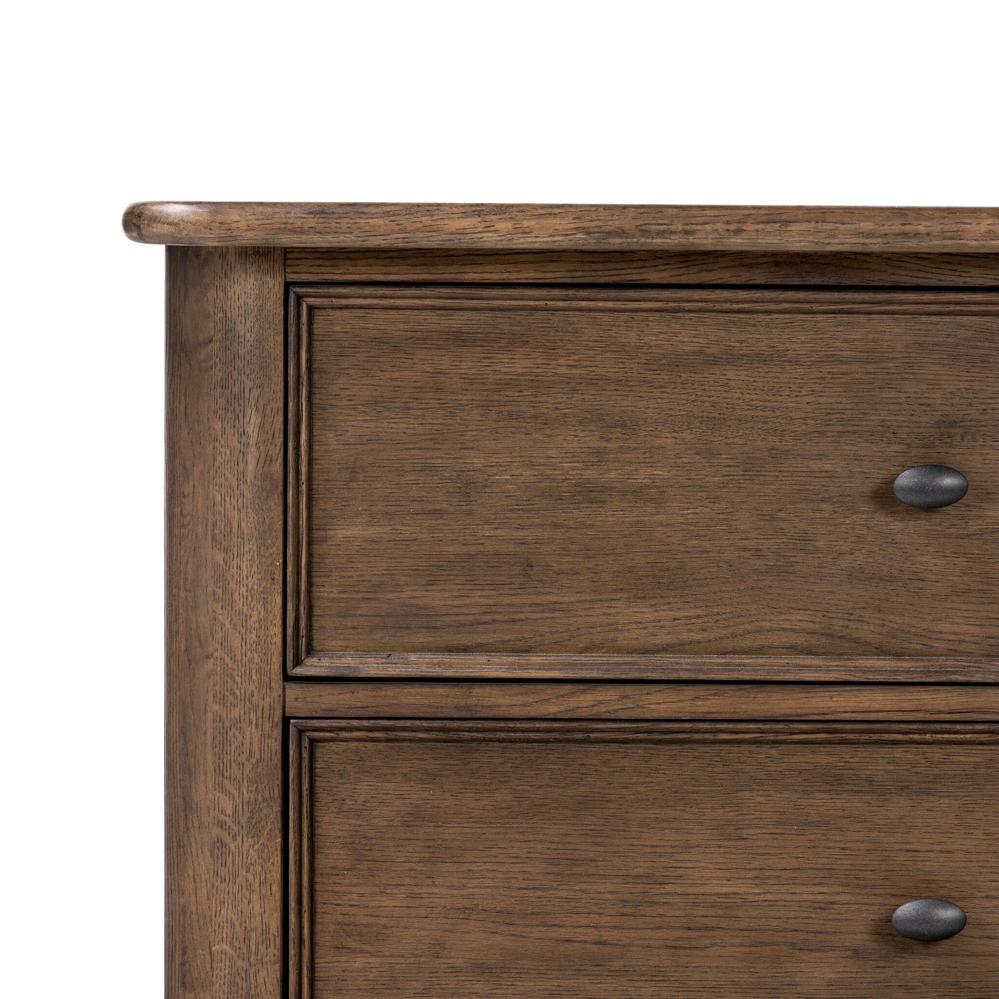 Featuring Russ Aged Oak Nightstand by Four Hands at Amethyst Home. Like an heirloom nightstand with two roomy drawers, this aged oak design has room for it all. Detailed with an overhang surface, carved edges top to bottom, angled legs and oval drawer pulls finished in dark gunmetal.
Collection: BoltonColors: Aged Oak, Aged Oak VeneerMaterials: Solid Oa. Amethyst Home provides interior design, new home construction design consulting, vintage area rugs, and lighting in the Newport Beach metro area.