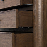 Featuring Russ Aged Oak Tall Dresser by Four Hands at Amethyst Home. Like an heirloom tallboy with six drawers, this aged oak dresser has room for it all. Detailed with an overhang surface, carved edges top to bottom, angled legs and oval drawer pulls finished in dark gunmetal.
Overall Dimensions: 21.0" L x 39.0 " W x 53.0" H
Collection: BoltonColors: Aged Oak. Amethyst Home provides interior design, new home construction design consulting, vintage area rugs, and lighting in the Boston metro area.