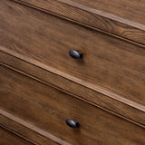 Featuring Russ Aged Oak Tall Dresser by Four Hands at Amethyst Home. Like an heirloom tallboy with six drawers, this aged oak dresser has room for it all. Detailed with an overhang surface, carved edges top to bottom, angled legs and oval drawer pulls finished in dark gunmetal.
Overall Dimensions: 21.0" L x 39.0 " W x 53.0" H
Collection: BoltonColors: Aged Oak. Amethyst Home provides interior design, new home construction design consulting, vintage area rugs, and lighting in the Dallas metro area.