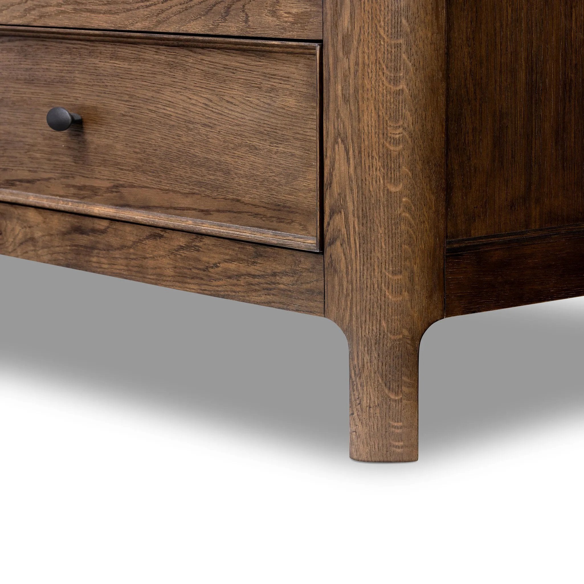 Featuring Russ Aged Oak Tall Dresser by Four Hands at Amethyst Home. Like an heirloom tallboy with six drawers, this aged oak dresser has room for it all. Detailed with an overhang surface, carved edges top to bottom, angled legs and oval drawer pulls finished in dark gunmetal.
Overall Dimensions: 21.0" L x 39.0 " W x 53.0" H
Collection: BoltonColors: Aged. Amethyst Home provides interior design, new home construction design consulting, vintage area rugs, and lighting in the Des Moines metro area.