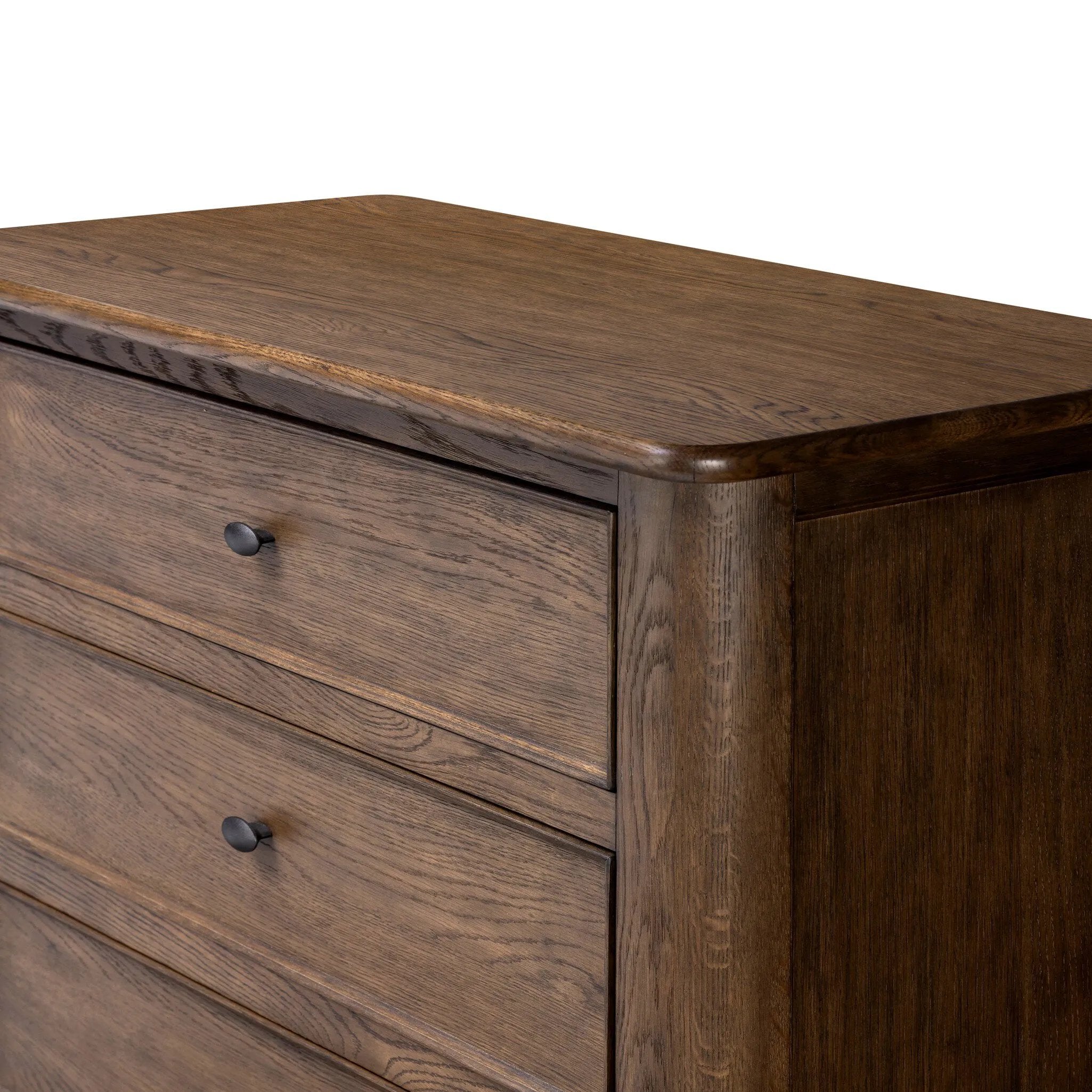 Featuring Russ Aged Oak Tall Dresser by Four Hands at Amethyst Home. Like an heirloom tallboy with six drawers, this aged oak dresser has room for it all. Detailed with an overhang surface, carved edges top to bottom, angled legs and oval drawer pulls finished in dark gunmetal.
Overall Dimensions: 21.0" L x 39.0 " W x 53.0" H
Collection: BoltonColors: Aged Oak . Amethyst Home provides interior design, new home construction design consulting, vintage area rugs, and lighting in the Tampa metro area.
