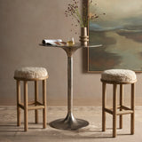 Featuring Saldino Stool by Four Hands at Amethyst Home. Bring a textural touch to the counter with the Saldino stool. Blonde-finished solid parawood supports rounded seating of soft beige shearling for comfort and style alike.
Overall Dimensions: 17"W x 17"L x 26"HColors: Blonde Nettlewood, Beige ShearlingMaterials: Solid Nettlewood, Shearling Weight: 15.21. Amethyst Home provides interior design, new home construction design consulting, vintage area rugs, and lighting in the San Diego metro area.