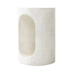 Featuring Samson Textured Lunar Concrete End Table by Four Hands at Amethyst Home. Made from textured white concrete, a cylinder shaped end table features a pill-shaped cutout for a light look. Subtle mottling adds a hint of texture.Collection: ChandlerColors: Textured Lunar ConcreteMaterials: Concrete Weight: 37.48 lbs. Amethyst Home provides interior design, new home construction design consulting, vintage area rugs, and lighting in the Laguna Beach metro area.