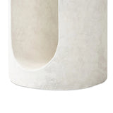 Featuring Samson Textured Lunar Concrete End Table by Four Hands at Amethyst Home. Made from textured white concrete, a cylinder shaped end table features a pill-shaped cutout for a light look. Subtle mottling adds a hint of texture.Collection: ChandlerColors: Textured Lunar ConcreteMaterials: Concrete Weight: 37.48 lbs. Amethyst Home provides interior design, new home construction design consulting, vintage area rugs, and lighting in the Park City metro area.