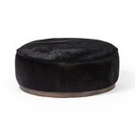Featuring Sinclair Dark Hair Large Round Ottoman by Four Hands at Amethyst Home. This large, round ottoman of textural hair-on hide brings with it a hip retro vibe as a coffee table or extra seating. Covered in soft and luminous black hair-on hide, which is naturally warm and textural with authentic highlights.
Overall Dimensions: 36"W x 36"L x 14.50"H
Collection: WestgateColors: Ru. Amethyst Home provides interior design, new construction, custom furniture, and area rugs in the Austin metro area.