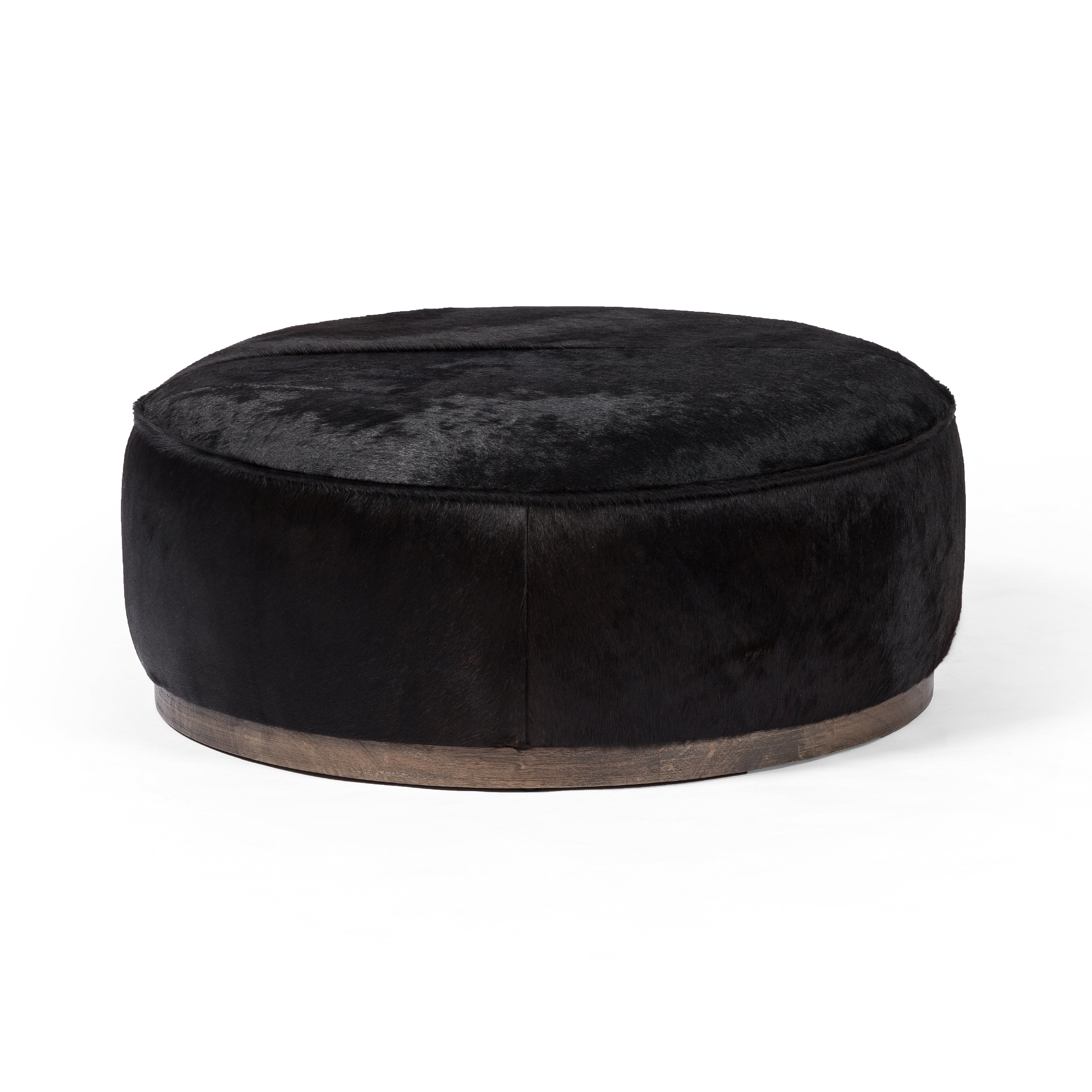 Featuring Sinclair Dark Hair Large Round Ottoman by Four Hands at Amethyst Home. This large, round ottoman of textural hair-on hide brings with it a hip retro vibe as a coffee table or extra seating. Covered in soft and luminous black hair-on hide, which is naturally warm and textural with authentic highlights.
Overall Dimensions: 36"W x 36"L x 14.50"H
Collection: WestgateColors: Ru. Amethyst Home provides interior design, new construction, custom furniture, and area rugs in the Austin metro area.