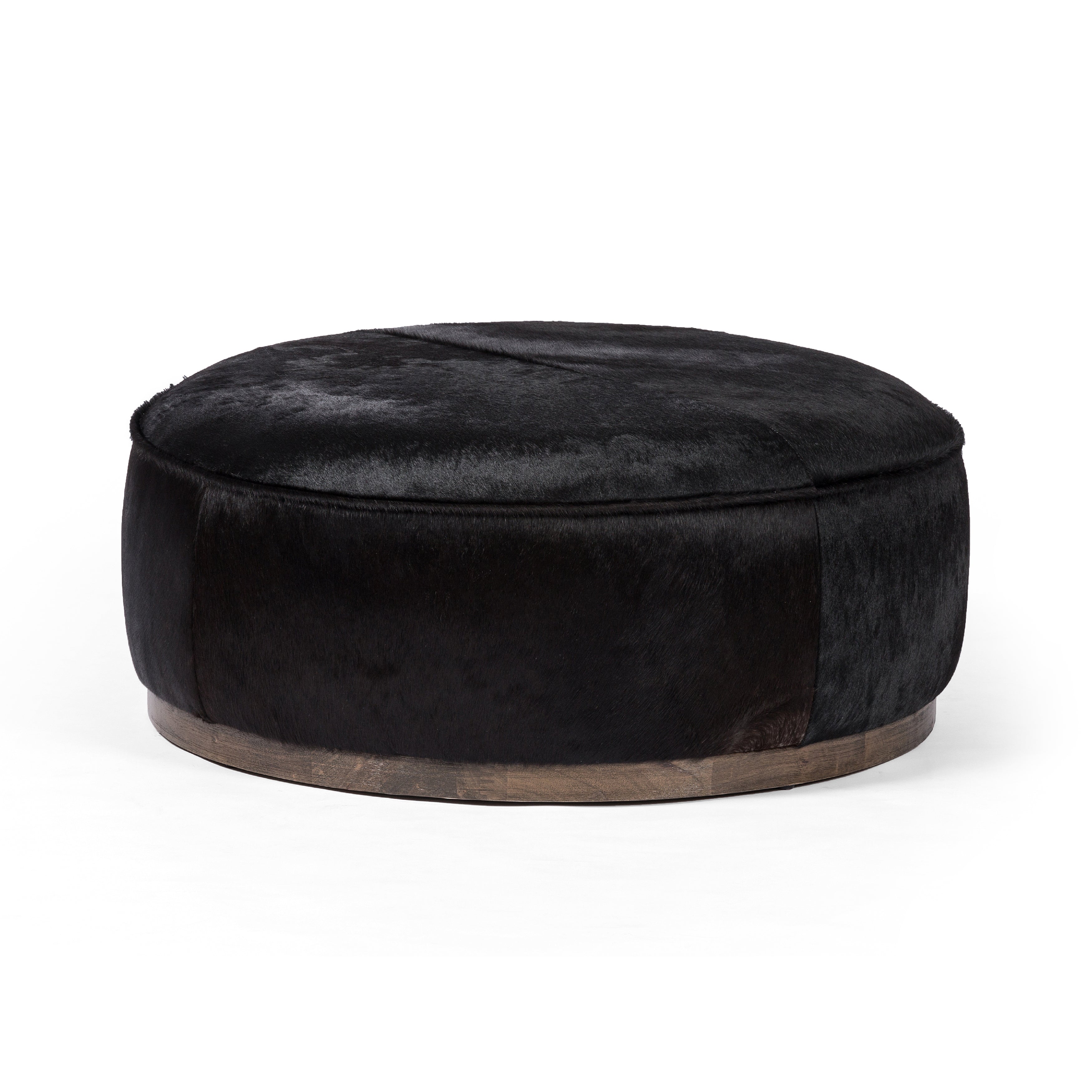 Featuring Sinclair Dark Hair Large Round Ottoman by Four Hands at Amethyst Home. This large, round ottoman of textural hair-on hide brings with it a hip retro vibe as a coffee table or extra seating. Covered in soft and luminous black hair-on hide, which is naturally warm and textural with authentic highlights.
Overall Dimensions: 36"W x 36"L x 14.50"H
Collection: WestgateColo. Amethyst Home provides interior design, new construction, custom furniture, and area rugs in the Laguna Beach metro area.