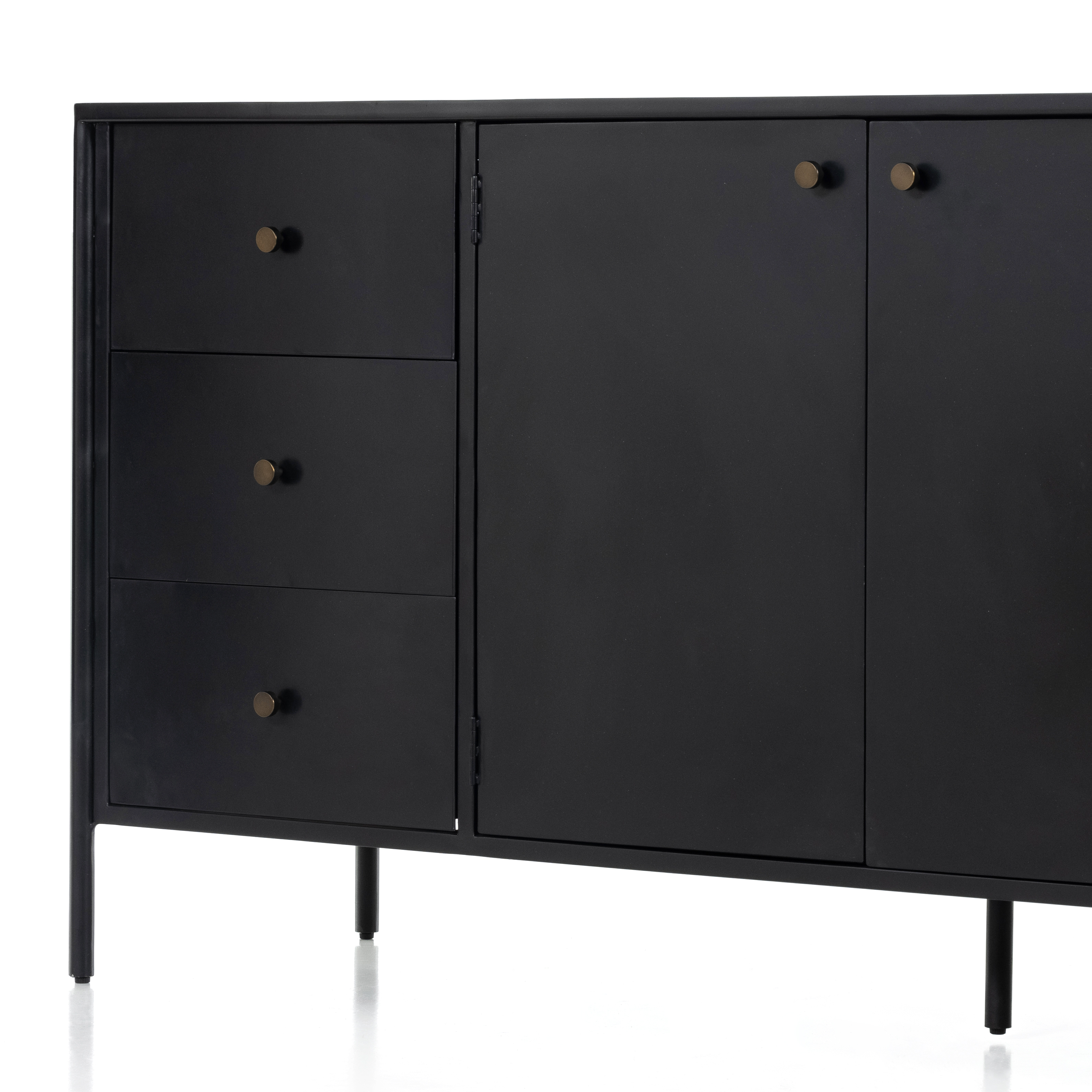 Featuring Soto Black Sideboard by Four Hands at Amethyst Home. Bring a softened industrial look to the dining room with a simple black-finished iron Soto Black Sideboard featuring bronzed iron hardware for modernity. Three roomy drawers plus generous closed cabinetry offer ample storage area for table linens, serveware and more.
Overall Dimensions: 74"W x 19"L x 34"H
. Amethyst Home provides interior design, new construction, custom furniture, and rugs for the Charlotte, North Carolina metro area.