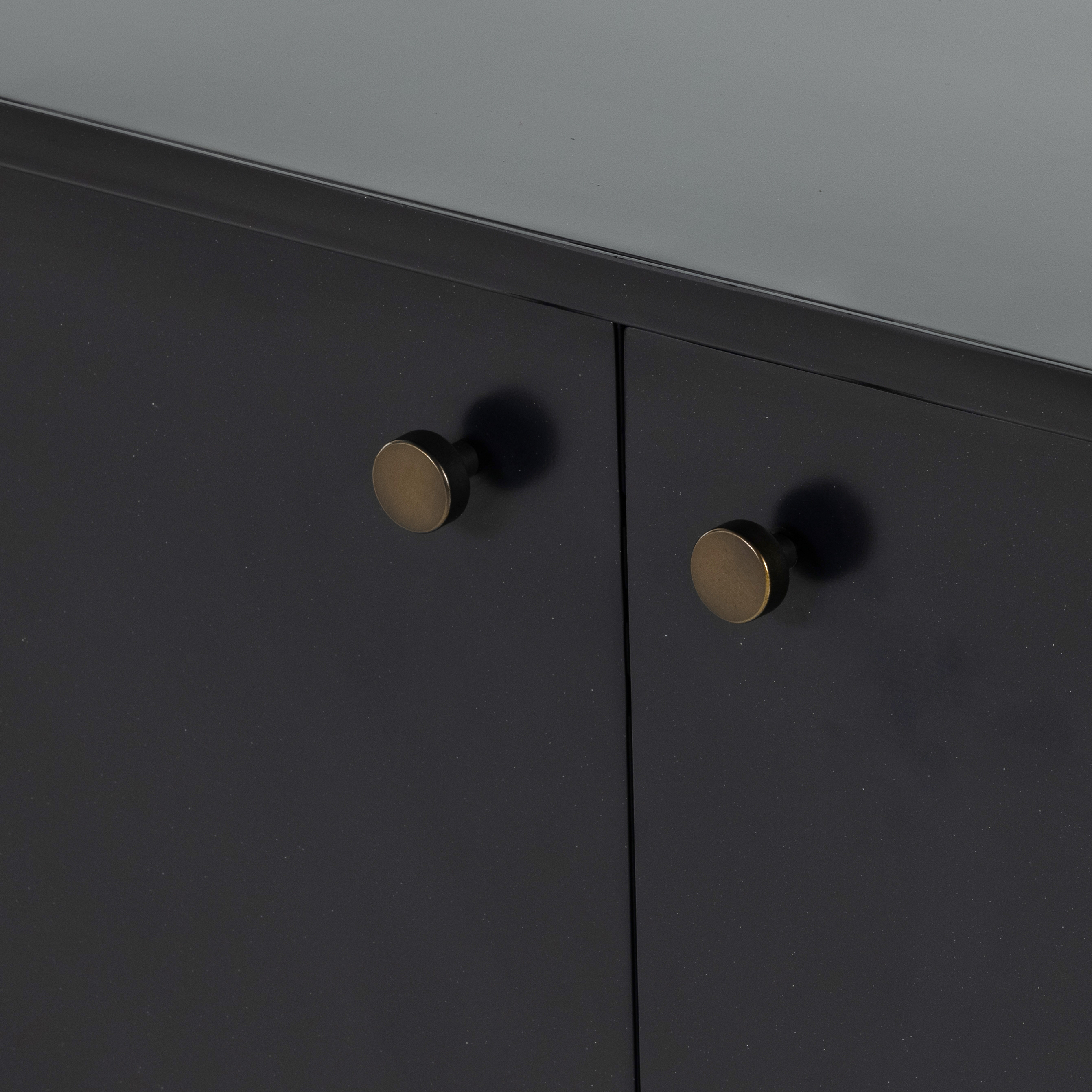 Featuring Soto Black Sideboard by Four Hands at Amethyst Home. Bring a softened industrial look to the dining room with a simple black-finished iron Soto Black Sideboard featuring bronzed iron hardware for modernity. Three roomy drawers plus generous closed cabinetry offer ample storage area for table linens, serveware and more.
Overall Dimensions: 74"W x 19"L x 34"H
Color. Amethyst Home provides interior design, new construction, custom furniture, and rugs for the Monterey, California metro area.