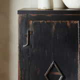 Featuring The Black Humptulips River Moonshine Cabinet by Four Hands at Amethyst Home. By the makers at Van Thiel, known for their antique-inspired pieces and hand-applied finishes. This wide but slim solid pine cabinet features door fronts with diamond cutout details and wire mesh inserts. Detailed with antique-inspired hardware and hinges. Metal-clad top in o. Amethyst Home provides interior design, new home construction design consulting, vintage area rugs, and lighting in the Tampa metro area.