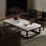Featuring The Travertine Rectangular Coffee Table by Four Hands at Amethyst Home. Airy while substantial, for an intriguing balance of scale. Bronzed iron forms an open, angular frame for a rectangular tabletop of solid white travertine. By the makers at Van Thiel, known for their antique-inspired pieces and hand-applied finishes.Overall Dimensions: 33"W . Amethyst Home provides interior design, new home construction design consulting, vintage area rugs, and lighting in the Los Angeles metro area.