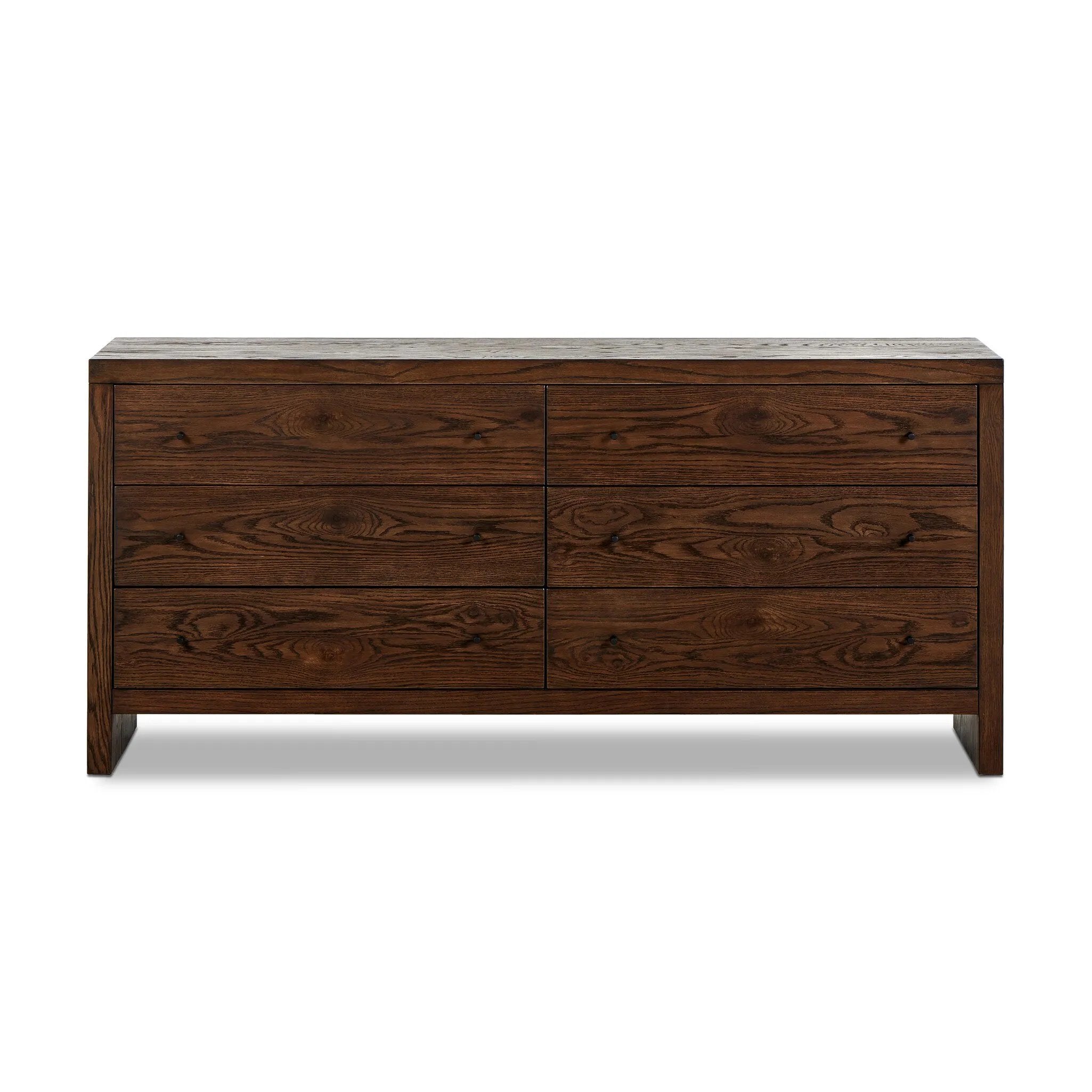 Featuring Torrington Umber Oak 6 Drawer Dresser by Four Hands at Amethyst Home. Straight planks of solid umber oak and veneer encase this spacious dresser for an understated modern look. Deep wood grain adds natural character.
Overall Dimensions: 20.0" L x 75.0 " W x 34.0" H
Collection: HamiltonColors: Umber Oak ,Umber Oak VeneerMaterials: Resawn Oak ,Oak . Amethyst Home provides interior design, new home construction design consulting, vintage area rugs, and lighting in the Washington metro area.