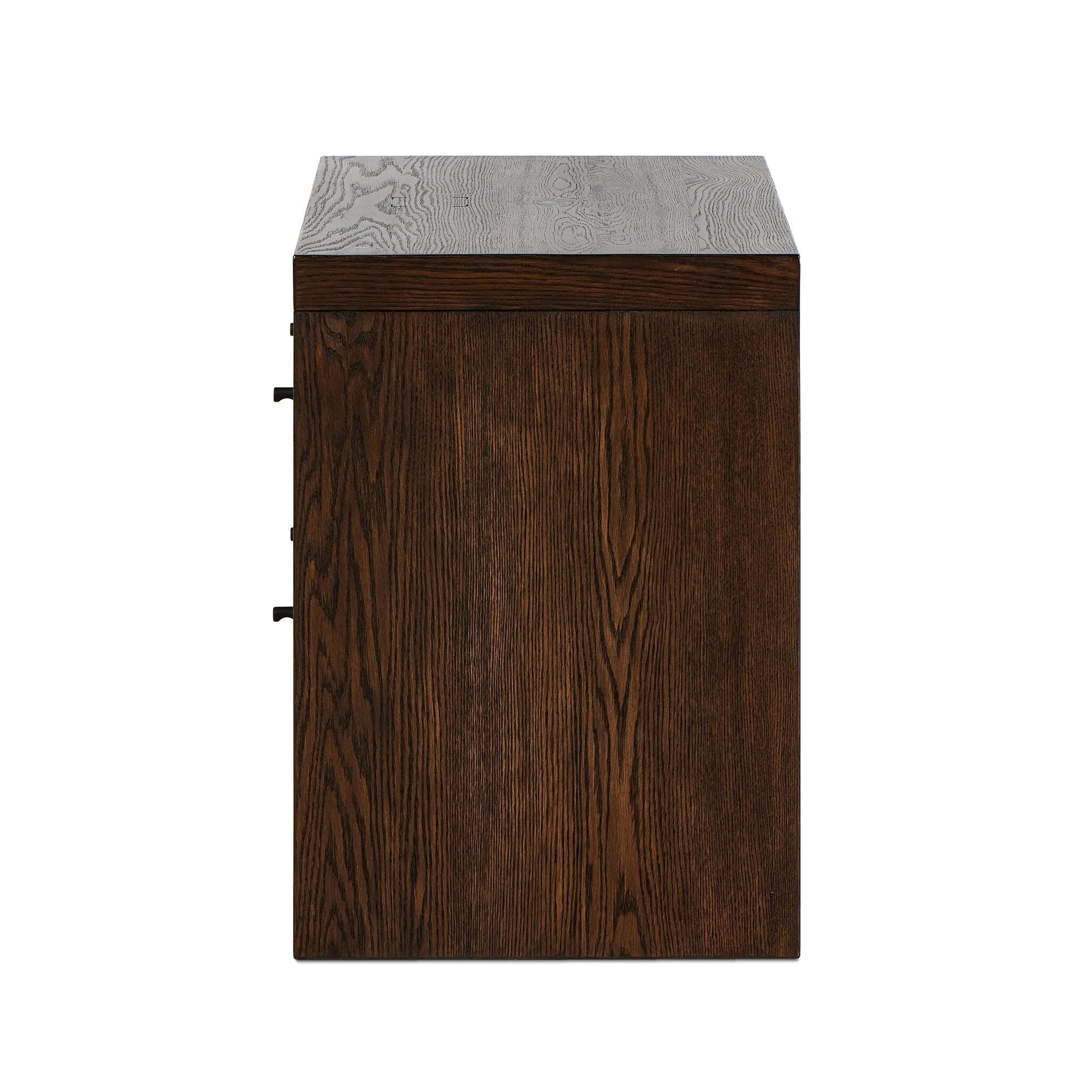 Featuring Torrington Umber Oak Nightstand by Four Hands at Amethyst Home. Straight planks of solid umber oak and veneer encase this spacious dresser for an understated modern look. Deep wood grain adds natural character. Invisible wireless charging for Android and Apple products.
Collection: HamiltonColors: Umber Oak, Umber Oak VeneerMaterials: Resawn Oak, O. Amethyst Home provides interior design, new home construction design consulting, vintage area rugs, and lighting in the Portland metro area.