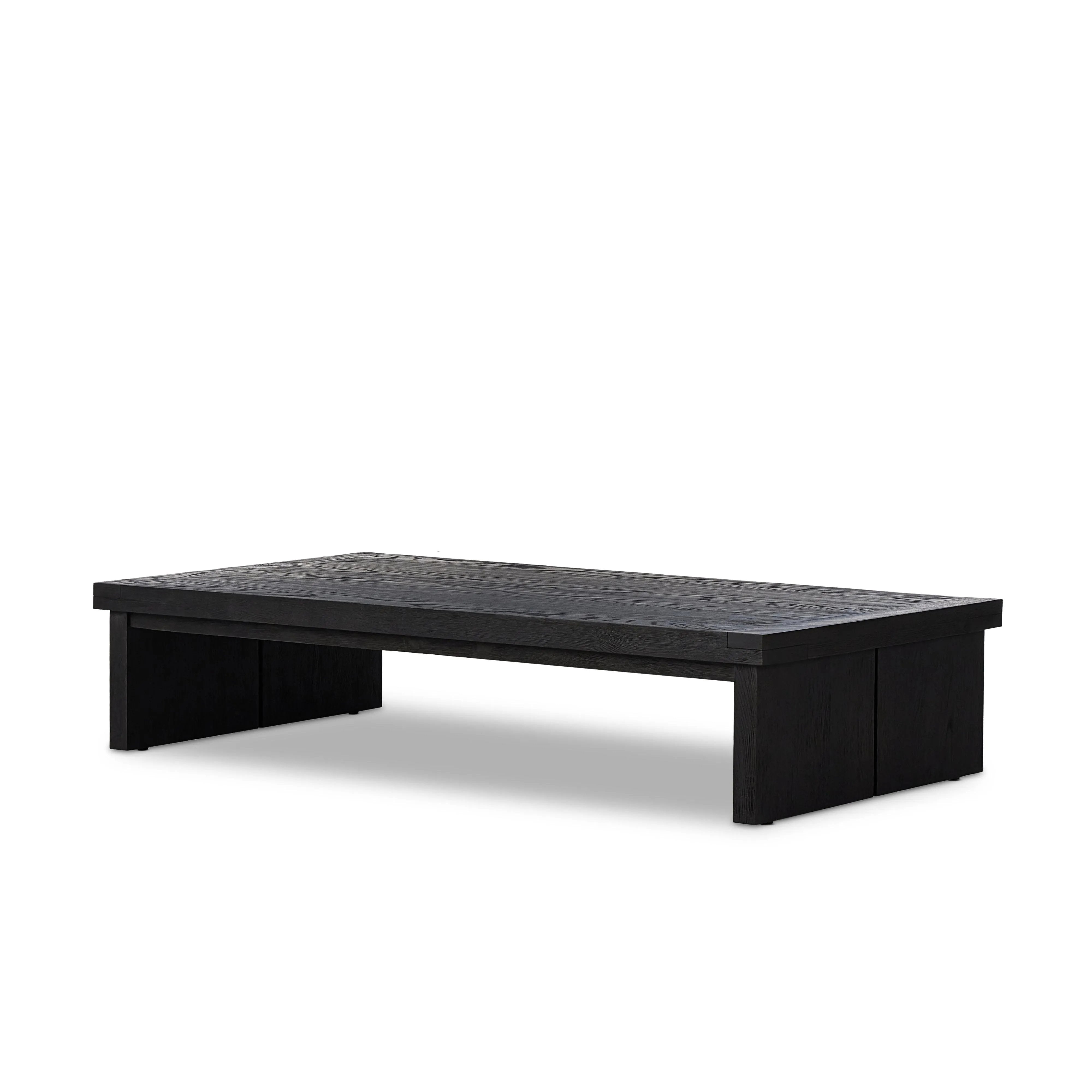 Featuring Warby Worn Black Oak Coffee Table by Four Hands at Amethyst Home. Black-finished oak shapes a streamlined coffee table with a rich while minimalist look.Overall Dimensions: 36"W x 65"L x 14"H
Collection: BennettColors: Worn Black Veneer ,Worn Black OakMaterials: Thick Oak Veneer ,Solid Oak Weight: 125.66 lbsClearance from Floor: 10.25"Distance Betwee. Amethyst Home provides interior design, new home construction design consulting, vintage area rugs, and lighting in the Dallas metro area.