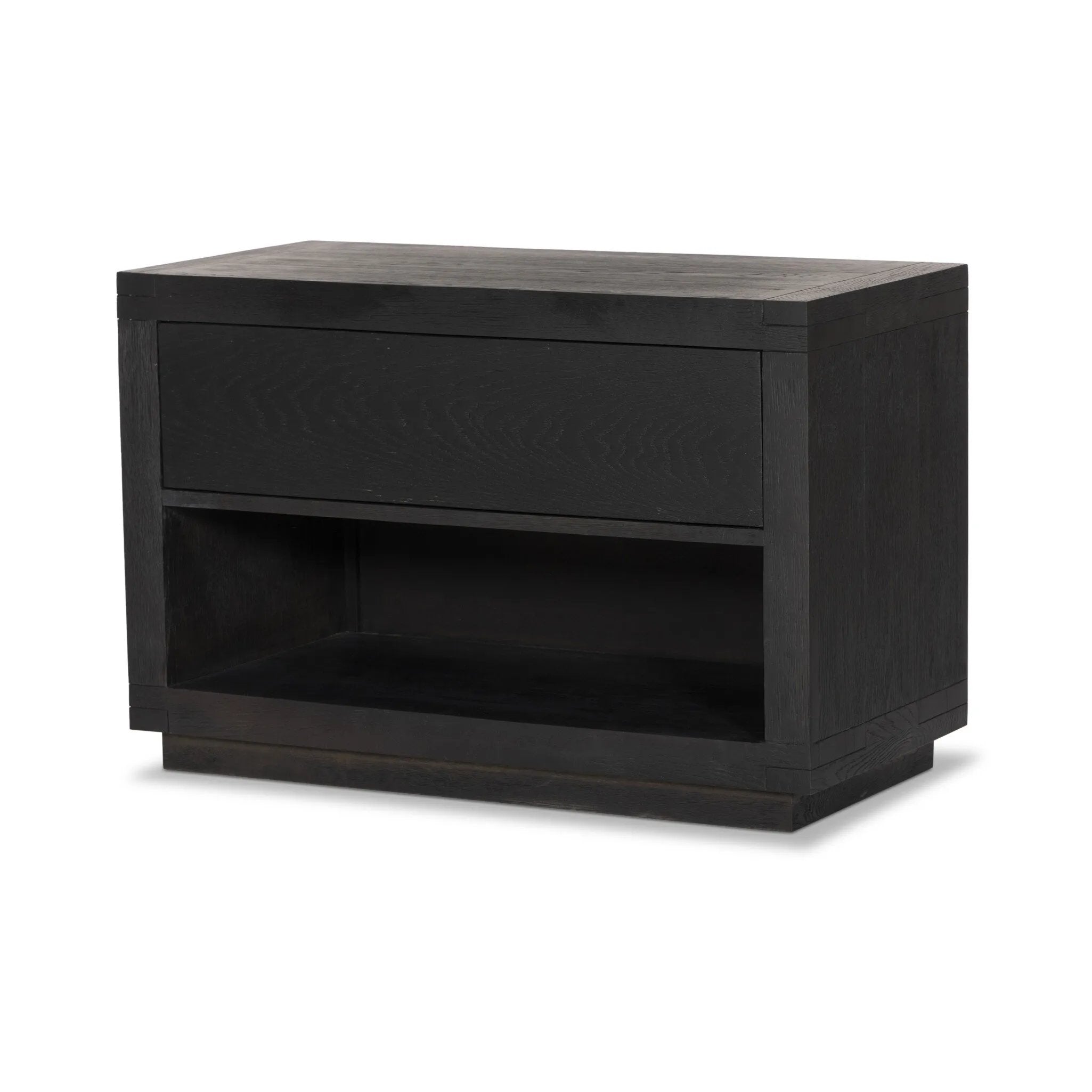Featuring Warby Worn Black Oak Nightstand by Four Hands at Amethyst Home. Solid acacia shapes a streamlined box-style nightstand, with lap joint corners for a detail-driven touch. Finished with smooth, push-latch drawer glides.Collection: BennettColors: Worn Black Oak ,Worn Black VeneerMaterials: Solid Oak ,Thick Oak Veneer Weight: 94.8 lbs. Amethyst Home provides interior design, new home construction design consulting, vintage area rugs, and lighting in the Houston metro area.