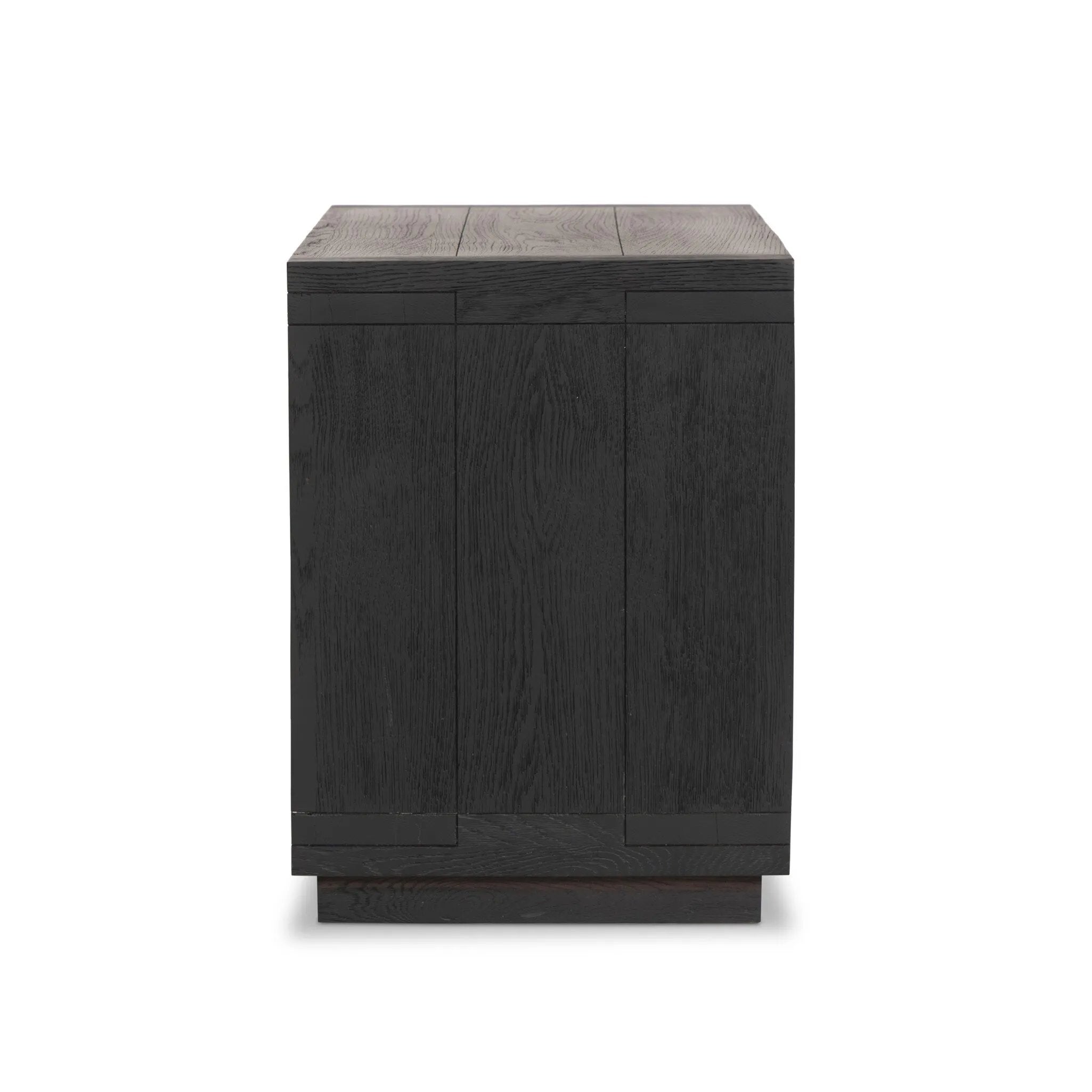 Featuring Warby Worn Black Oak Nightstand by Four Hands at Amethyst Home. Solid acacia shapes a streamlined box-style nightstand, with lap joint corners for a detail-driven touch. Finished with smooth, push-latch drawer glides.Collection: BennettColors: Worn Black Oak ,Worn Black VeneerMaterials: Solid Oak ,Thick Oak Veneer Weight: 94.8 lbs. Amethyst Home provides interior design, new home construction design consulting, vintage area rugs, and lighting in the Salt Lake City metro area.