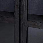 Featuring Warby Worn Black Cabinet by Four Hands at Amethyst Home. This minimal-inspired bookcase is crafted from a mix of solid oak and worn black veneer. Featuring glass-front doors and spacious shelves for storage and display.
Overall Dimensions: 18.0" L x 42.0" W x 94.0" H
Collection: BennettColors: Worn Black Veneer, Worn Black OakMaterials: Thick Oa. Amethyst Home provides interior design, new home construction design consulting, vintage area rugs, and lighting in the Los Angeles metro area.