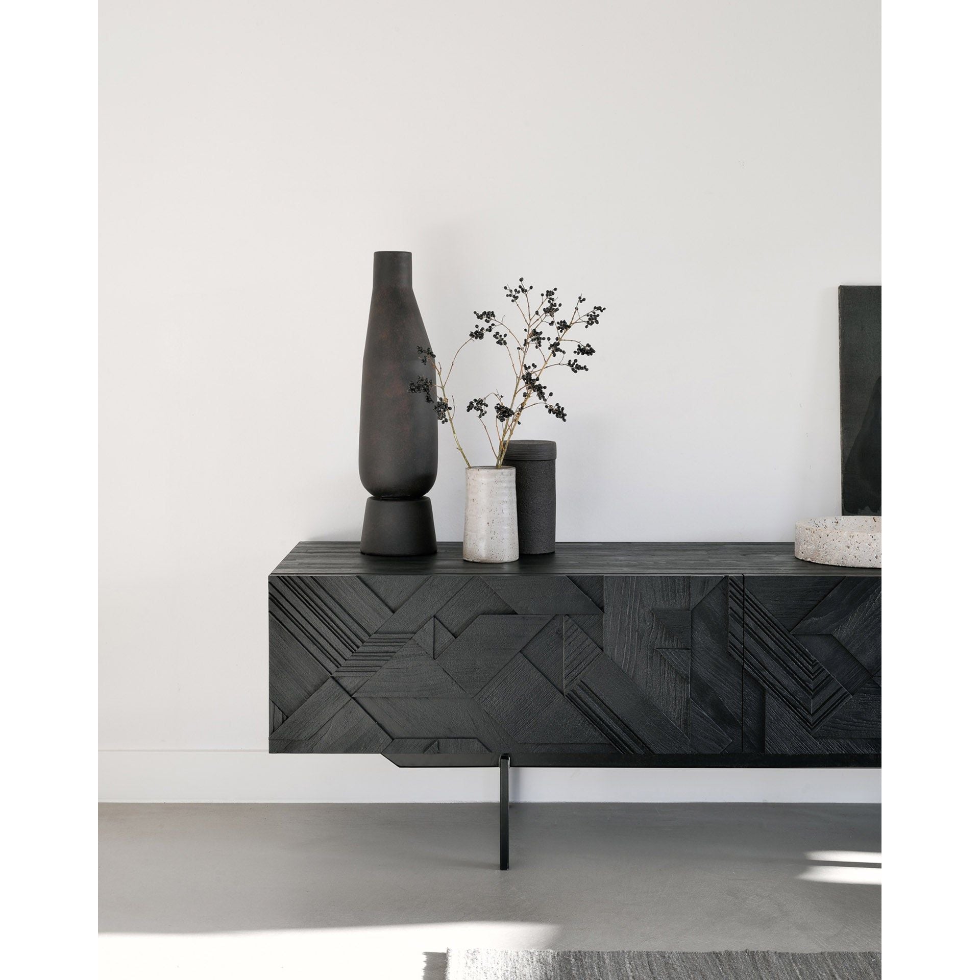 Featuring Graphic TV Cupboard by Ethnicraft at Amethyst Home. In his quest to add movement to the surface, our designer Alain van Havre started layering and combining triangular shapes. Before he knew it, he had created an interesting composition out of teak. Originally used for our popular Teak Graphic sideboard, the pattern now translates perfectly to a new TV cupboard.
This Graphic TV cupb. Amethyst Home provides interior design services, furniture, rugs, and lighting in the Houston metro area.