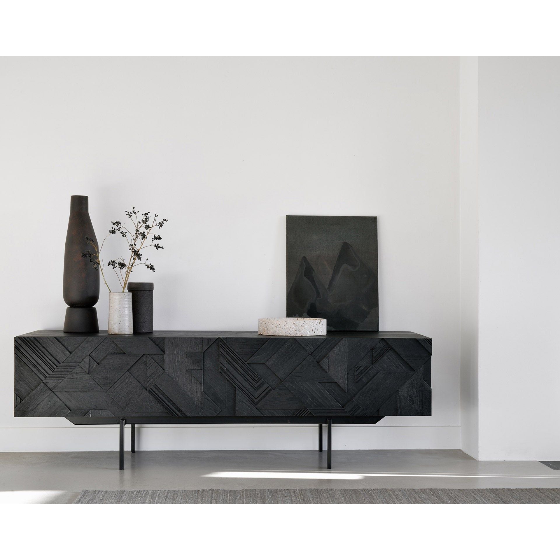 Featuring Graphic TV Cupboard by Ethnicraft at Amethyst Home. In his quest to add movement to the surface, our designer Alain van Havre started layering and combining triangular shapes. Before he knew it, he had created an interesting composition out of teak. Originally used for our popular Teak Graphic sideboard, the pattern now translates perfectly to a new TV cupboard.
This Graphic TV cupb. Amethyst Home provides interior design services, furniture, rugs, and lighting in the Seattle metro area.