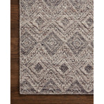 Featuring Raven Taupe / Grey Rug by Loloi at Amethyst Home. The Raven Taupe / Grey Rug is intricately handwoven with delicate, fine yarns that amplify the rug's layered and dimensional geometric design. While the rug itself is thick and sturdy, the colors and patterns have a casual lightness that can work in many spaces, from busy living rooms to serene bedrooms. The Raven Taupe. Amethyst Home provides interior design, new construction, custom furniture, and area rugs in the Alpharetta metro area.