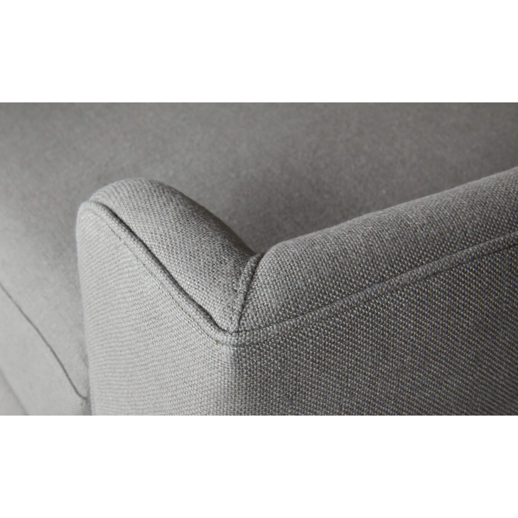 Featuring Gunner Upholstered 84" Sofa by Cisco Brothers at Amethyst Home. A chic, yet simple design, the Gunner Upholstered Sofa by Cisco Brothers boasts a streamlined frame supported by tapered legs. This sofa is beautifully detailed, with piping on the body and top stitch on cushions. It has a traditional yet sleek look, ideal for entertaining. Photogr. Amethyst Home provides interior design, new home construction design consulting, vintage area rugs, and lighting in the Scottsdale metro area.