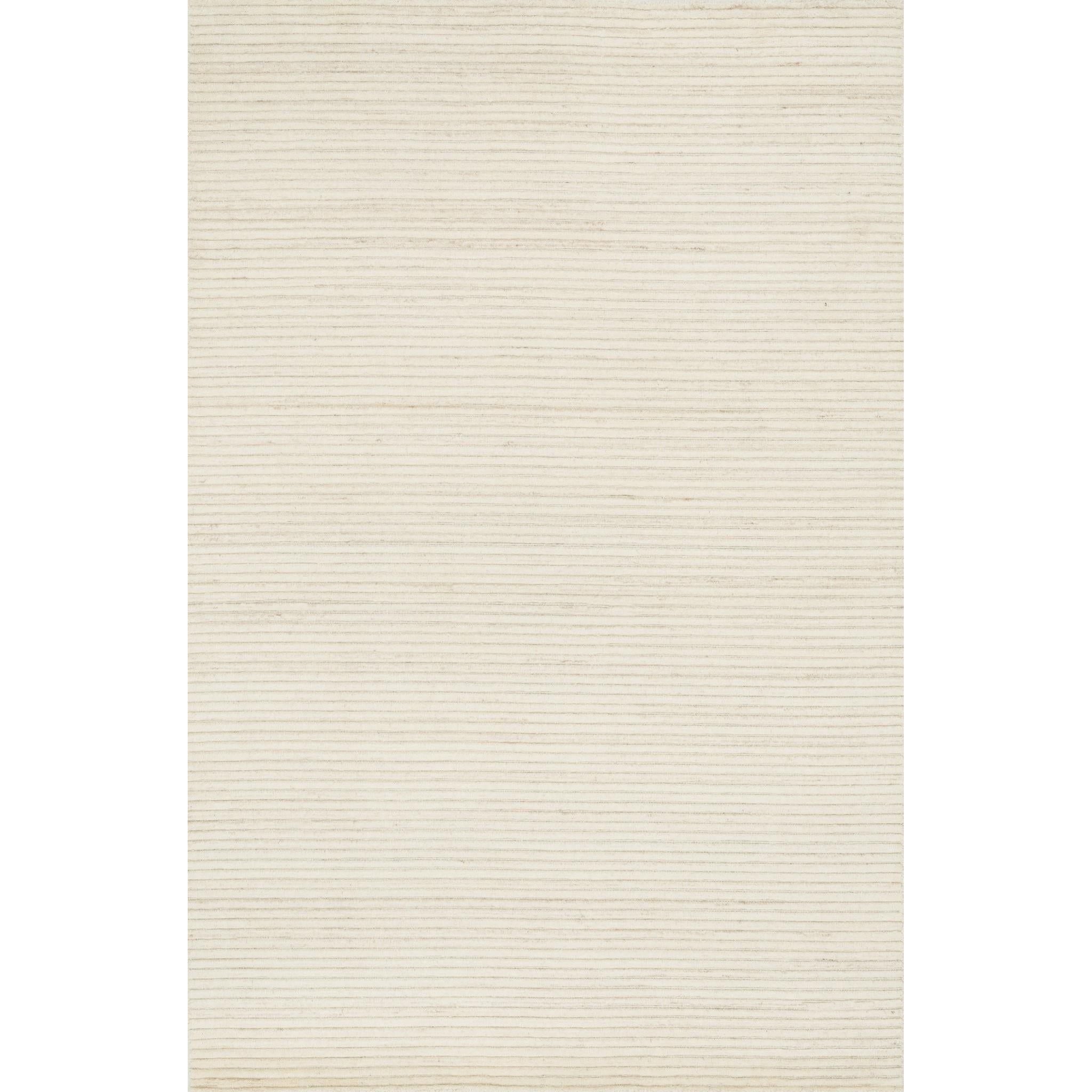 Featuring Hadley Ivory Rug by Loloi at Amethyst Home. Natural beauty is expressed in an understated fashion with the Hadley Collection, an eco-friendly collection of 100% undyed wool. Loom knotted, the Hadley features an intriguing cut pile and loop combination which adds distinctive texture to these handsome and durable designs. Also, the muted colors fit ea.  Amethyst Home provides interior design, new home construction design consulting, vintage area rugs, and lighting in the Boston metro area.