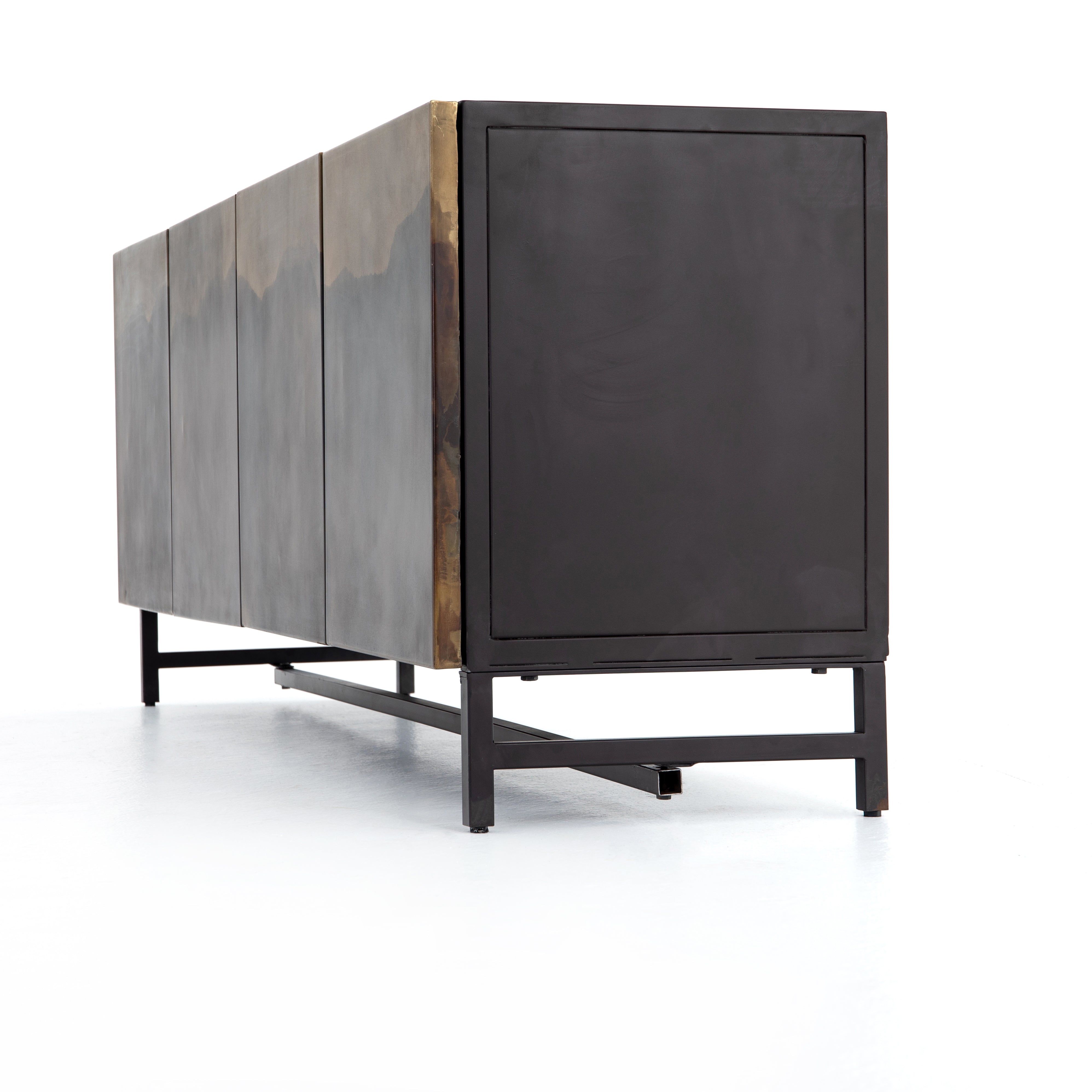 Featuring Stormy Media Console by Four Hands at Amethyst Home. Irons distressed ombre finish emits a feeling of movement that keeps the eye moving. The spacious interior of the Stormy Media Console brings plenty of space to media storage. Oxidation varies from piece to piece, due to organic nature of materials.
Materials: IronFinish: Oxidized
72" Size: 72"w x 18"d x 27"hWeight:. Amethyst Home provides interior design, new construction, custom furniture, and area rugs in the Winter Park metro area.