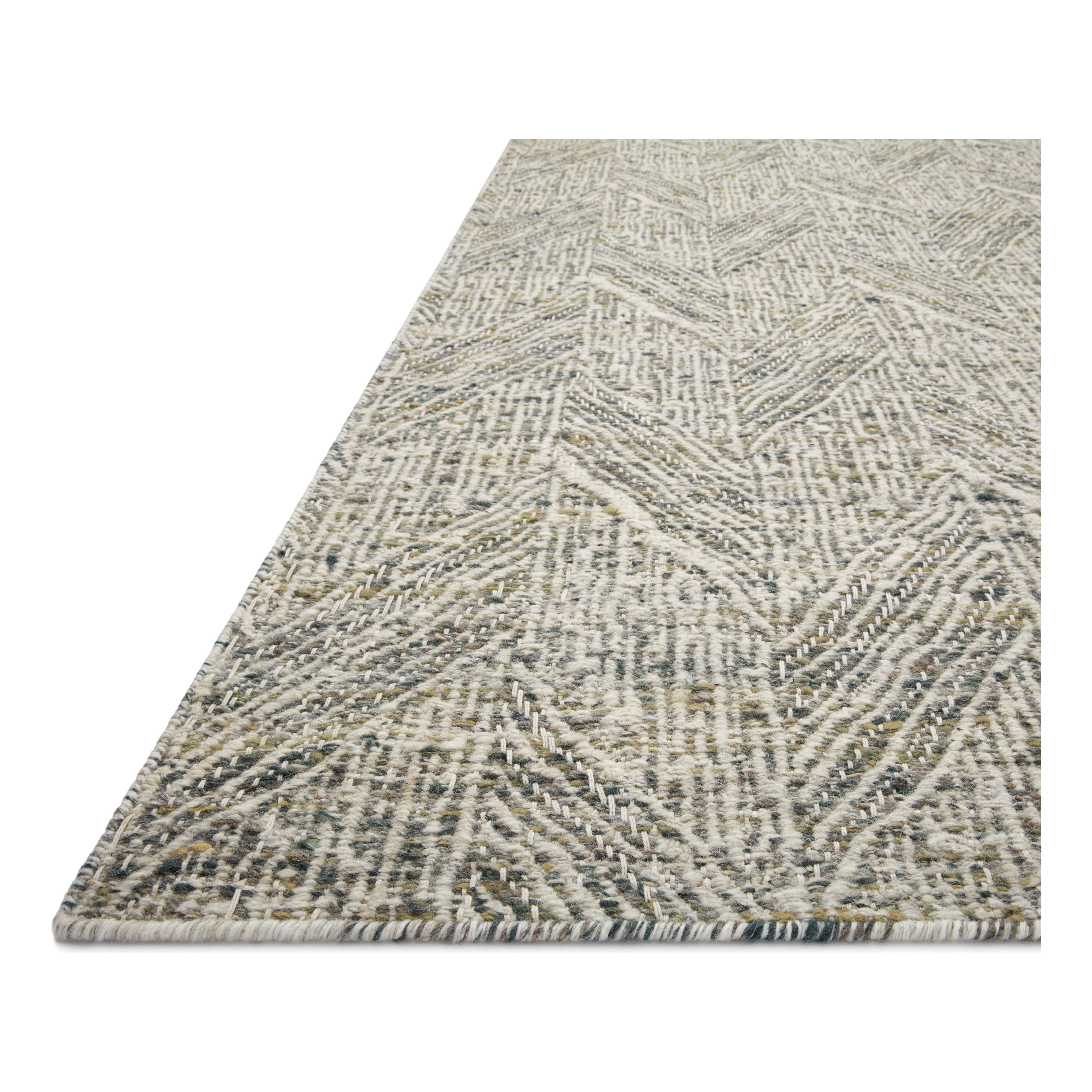 Featuring Raven Moss / Ivory Rug by Loloi at Amethyst Home. The Raven Moss / Ivory Rug is intricately handwoven with delicate, fine yarns that amplify the rug's layered and dimensional geometric design. While the rug itself is thick and sturdy, the colors and patterns have a casual lightness that can work in many spaces, from busy living rooms to serene bedrooms. The Raven Moss / Iv. Amethyst Home provides interior design, new construction, custom furniture, and area rugs in the Dallas metro area.
