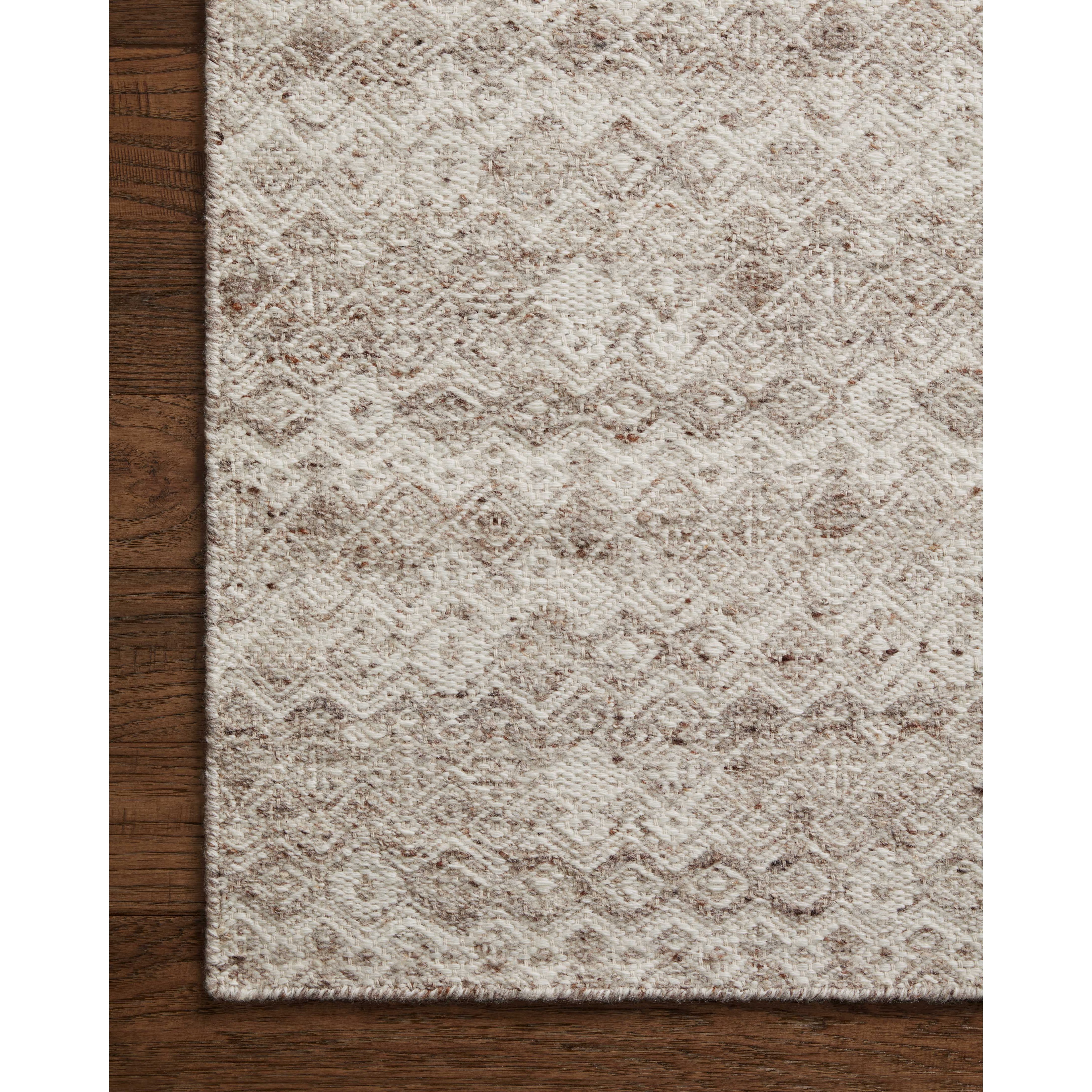 Featuring Raven Dove / Ivory Rug by Loloi at Amethyst Home. The Raven Dove / Ivory Rug is intricately handwoven with delicate, fine yarns that amplify the rug's layered and dimensional geometric design. While the rug itself is thick and sturdy, the colors and patterns have a casual lightness that can work in many spaces, from busy living rooms to serene bedrooms. The Raven Dove / Ivo. Amethyst Home provides interior design, new construction, custom furniture, and area rugs in the Tampa metro area.