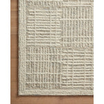 Featuring Tallulah Mist / Ivory Rug by Loloi at Amethyst Home. Hand-crafted with a combination of thick and fine yarns, the Tallulah Mist / Ivory Rug area rug creates dynamic dimension in living rooms, bedrooms, and more. The thicker yarns define the abstract, linear design, giving the rug a distinct high-low texture and sense of movement. Tallulah's soft, neutral palettes have a de. Amethyst Home provides interior design, new construction, custom furniture, and area rugs in the Austin metro area.