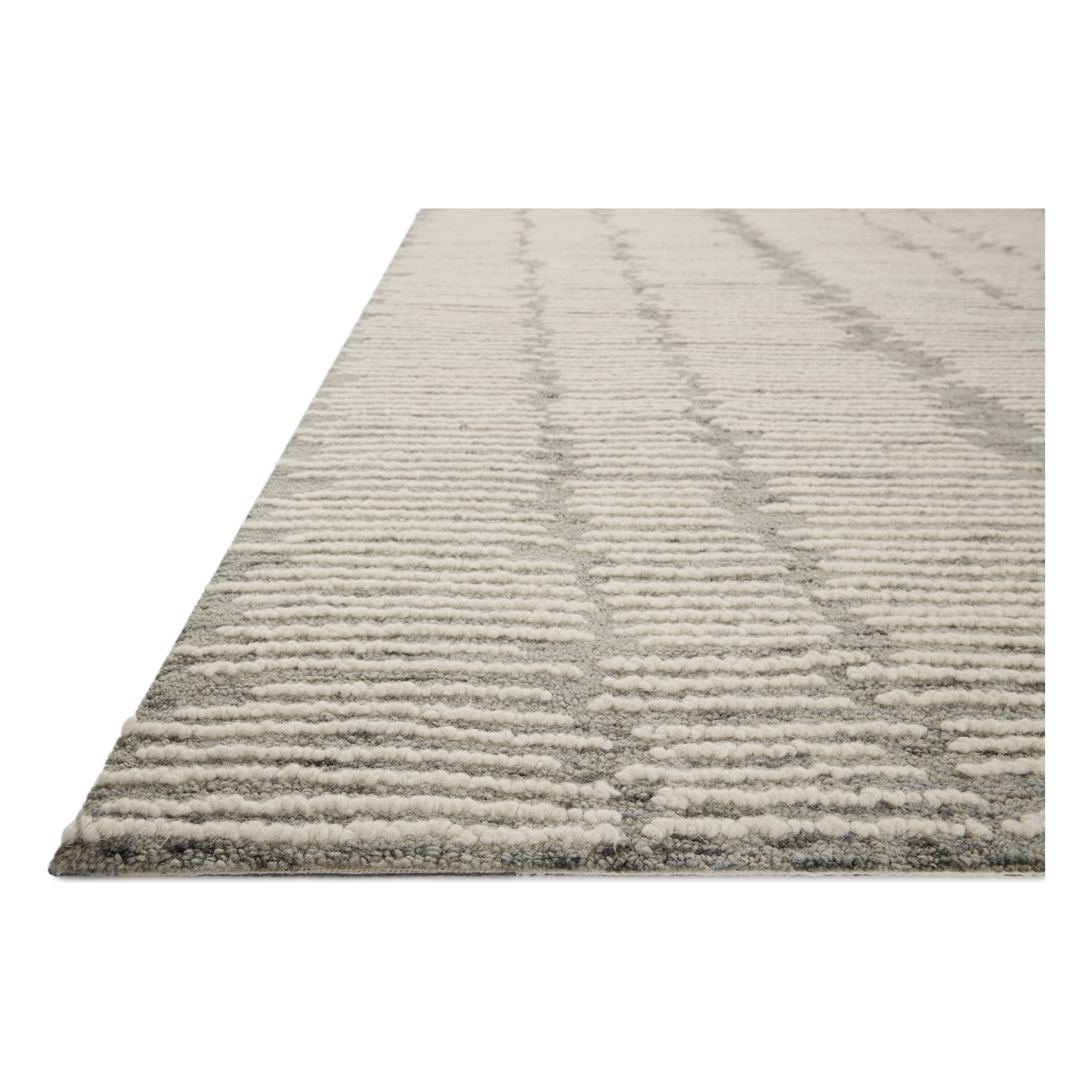 Featuring Tallulah Stone / Ivory Rug by Loloi at Amethyst Home. Hand-crafted with a combination of thick and fine yarns, the Tallulah Stone / Ivory Rug area rug creates dynamic dimension in living rooms, bedrooms, and more. The thicker yarns define the abstract, linear design, giving the rug a distinct high-low texture and sense of movement. Tallulah's soft, neutral palettes ha. Amethyst Home provides interior design, new construction, custom furniture, and area rugs in the Kansas City metro area.