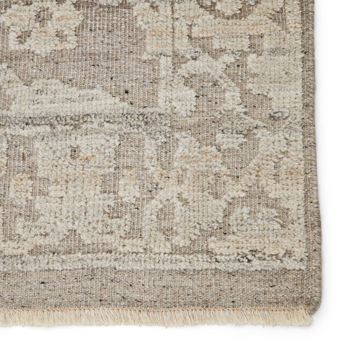 Featuring Sonnette Ayres Hand-Knotted Rug by Jaipur Living at Amethyst Home. The richly textured and elegantly designed Sonnette Ayres Area Rug combines an inviting, soft hand and eye-catching transitional style. The Ayres rug boasts a neutral palette of light taupe and gray that creates beautiful dimension among the brocade design. This hand-knotted wool.  Amethyst Home provides interior design, new home construction design consulting, vintage area rugs, and lighting in the Scottsdale metro area.