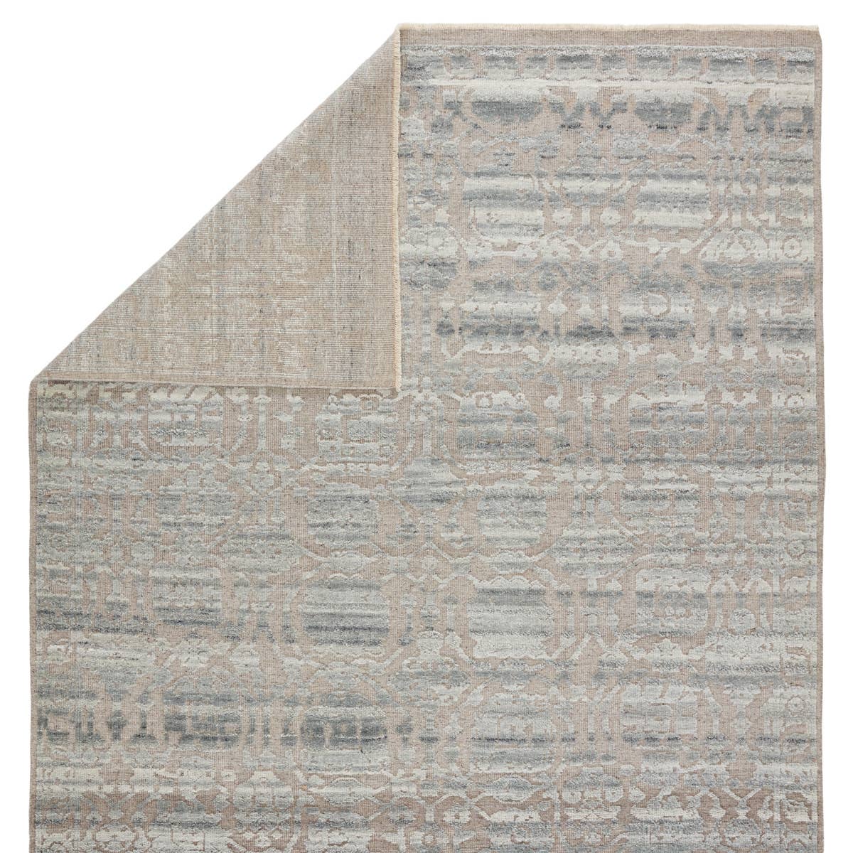 Featuring Sonnette Pearson Hand-Knotted Rug by Jaipur Living at Amethyst Home. The richly textured and elegantly designed Sonnette Pearson Area Rug combines an inviting, soft hand and eye-catching transitional style. The Sonnette area rug has a subtle design with gorgeous tonal grays and taupes. This hand-knotted wool rug features fringe trimmed details f.  Amethyst Home provides interior design, new home construction design consulting, vintage area rugs, and lighting in the Des Moines metro area.