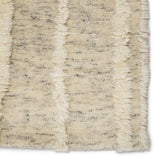 Featuring Tala Casamir Hand-Knotted Rug by Jaipur Living at Amethyst Home. The Tala Casamir Area Rug is a hand-knotted rug that brings a new sense of luxury and comfort to the contemporary home. The plush Casamir area rug makes a modern Moroccan statement, showcasing a crosshatched lattice design in an inviting cream hue with earthy toned flecks of bro.  Amethyst Home provides interior design, new home construction design consulting, vintage area rugs, and lighting in the Winter Garden metro area.