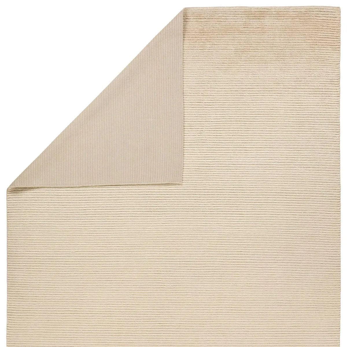 Featuring Aion Atropos Hand-Knotted Rug by Jaipur Living at Amethyst Home. Indulge in the Aion Atropos, where the extraordinary softness of Cashmere meets the enduring durability and resilience of New Zealand Wool. The longer length of New Zealand wool fibers contributes to the strength of this artfully finished product. Crafted to redefine sophistication, . Amethyst Home provides interior design, new home construction design consulting, vintage area rugs, and lighting in the Charlotte metro area.