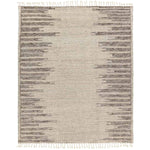Featuring Alpine Patra Hand-Knotted Rug by Jaipur Living at Amethyst Home. Inspired by textiles from the Tullu region in Morocco, the Patra area rug showcases a linear design in neutral shades of cream, taupe, brown, and gray. This high-piled accent lends warmth and comfort to any space with durable wool hand-knotted onto a cotton foundation. Braided fring. Amethyst Home provides interior design, new home construction design consulting, vintage area rugs, and lighting in the Washington metro area.