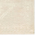 Featuring Ashend Vavite Hand-Knotted Rug by Jaipur Living at Amethyst Home. Hand carded wool, soft Tencel, and a neutral color palette define the handknotted Ashend Vavite. The Vavite rug showcases a Moroccan-inspired center medallion in a neutral cream and tan colorway. Geometric detailing establishes a thin border and provides a nod to the tribal styles. Amethyst Home provides interior design, new home construction design consulting, vintage area rugs, and lighting in the Los Angeles metro area.