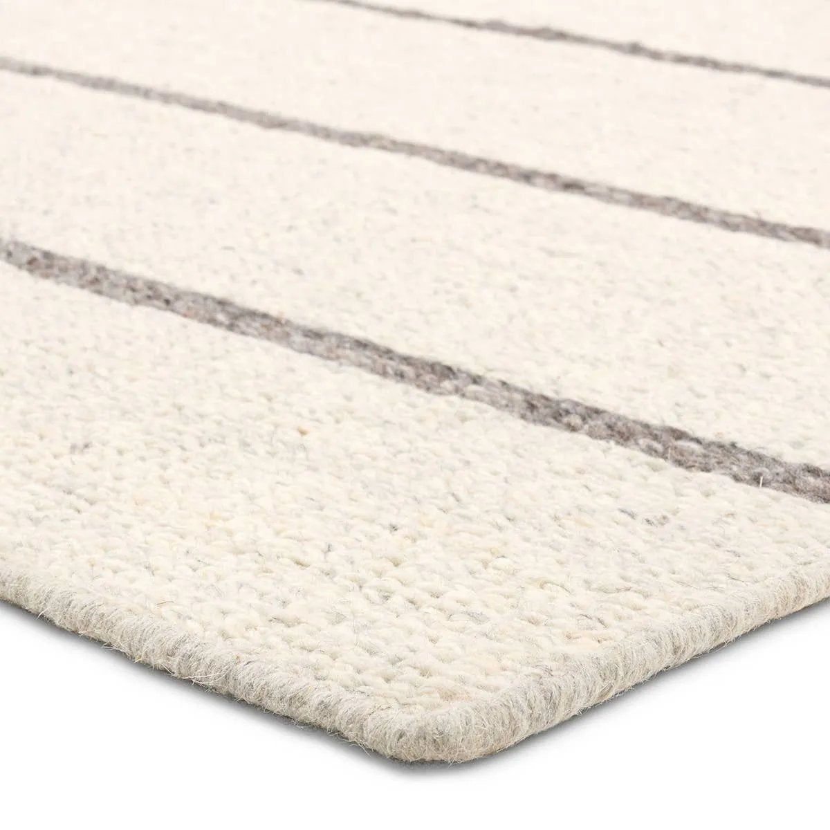 Featuring Bavell Almeda Rug by Jaipur Living at Amethyst Home. With its mesmerizing waves of 100% premium undyed artisanal wool, Norfolk adds an earthy, elemental ease to any modern interior. In unique combinations of creams and browns, the weaver’s impromptu selection of undyed yarn results in unexpected flecks of gray. Enjoy effortless style, and unsurpa. Amethyst Home provides interior design, new home construction design consulting, vintage area rugs, and lighting in the Des Moines metro area.